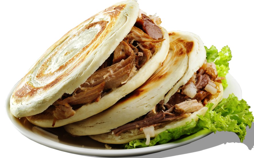 陕西地区有使用白吉馍的"腊汁肉夹馍",宝鸡西府的肉臊子夹馍(肉臊子中